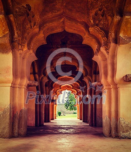 Vintage retro effect filtered hipster style travel image of Lotus Mahal arches. Royal Centre. Hampi, Karnataka, India