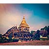Vintage retro effect filtered hipster style travel image of Buddhist temple Wat Chedi Luang in twilight. Chiang Mai, Thailand