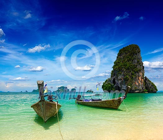 Long tail boats on tropical Pranang beach, Krabi, Thailand
