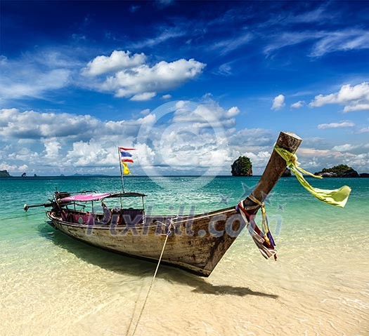 Long tail boat on tropical beach, Krabi, Thailand