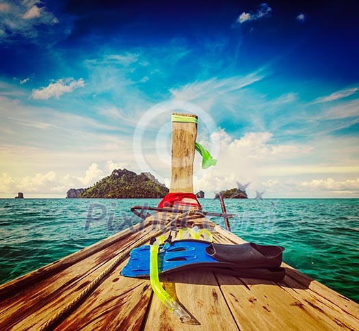 Vintage retro effect filtered hipster style travel image of snorkeling set on boat, sea, island. Thailand