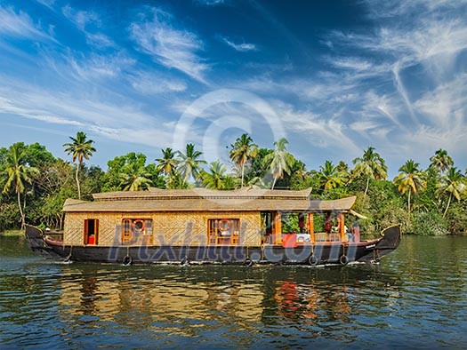 Travel tourism Kerala background - houseboat on Kerala backwaters. Kerala, India Travel tourism Kerala background - houseboat on Kerala backwaters. Kerala, India