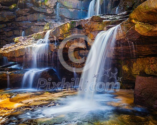 Tropical waterfall. Popokvil Waterfall, Bokor National Park, Cambodia Tropical waterfall. Popokvil Waterfall, Bokor National Park, Cambodia