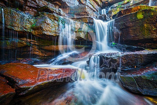 Tropical waterfall. Popokvil Waterfall, Bokor National Park, Cambodia Tropical waterfall. Popokvil Waterfall, Bokor National Park, Cambodia
