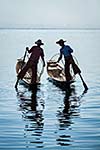 Myanmar travel attraction landmark - Traditional Burmese fisherman at Inle lake, Myanmar famous for their distinctive one legged rowing style