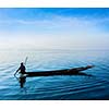 Myanmar travel attraction landmark - Traditional Burmese fisherman at Inle lake, Myanmar famous for their distinctive one legged rowing style