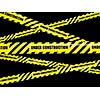 Under construction concept background - yellow warning caution ribbon tape on black background