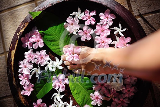 Closeup photo of a woman feet at spa salon on pedicure procedure. Legs care concept