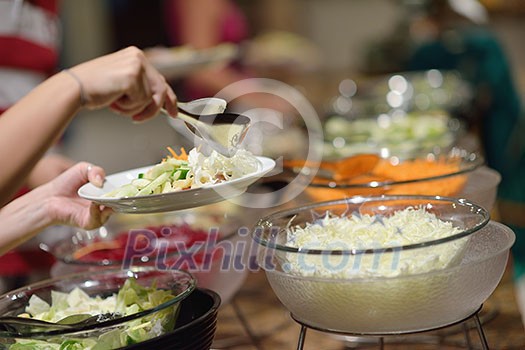 catering buffet food indoor in luxury restaurant with meat colorful fruits  and vegetables