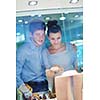 happy young romantic couple in love buy jewelry ring in luxury store