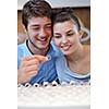 happy young romantic couple in love buy jewelry ring in luxury store