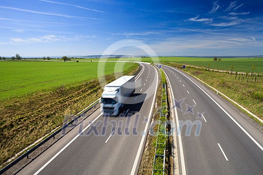highway traffic on a lovely, sunny summer day highway traffic on a lovely, sunny summer day