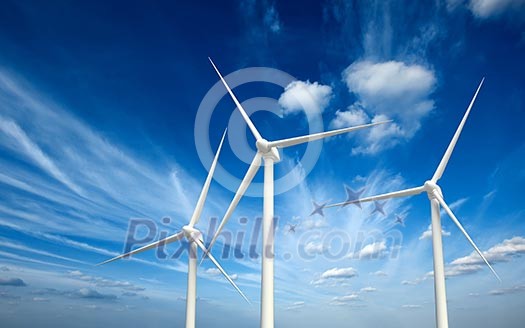 Green renewable energy concept - wind generator turbines in sky Green renewable energy concept - wind generator turbines in sky