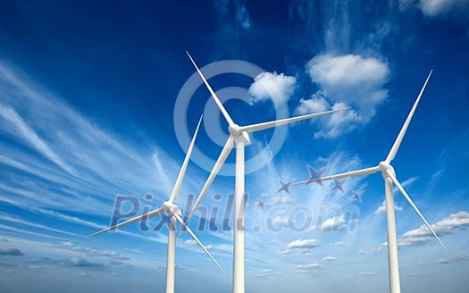 Green renewable energy concept - wind generator turbines in sky