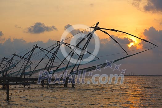 Kochi chinese fishnets on sunset. Fort Kochin, Kochi, Kerala, India Kochi chinese fishnets on sunset. Fort Kochin, Kochi, Kerala, India