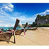 Long tail boats on tropical beach (Railay beach) in Thailand