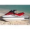 Jet ski on beach sand near sea