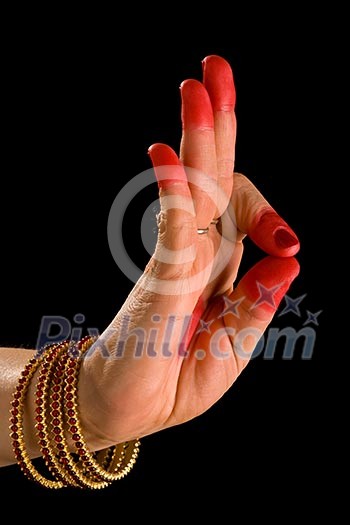 Woman hand showing Arala hasta (meaning bent) of indian classic dance Bharata Natyam