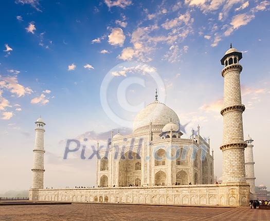 Taj Mahal on sunrise. Indian Symbol - India travel background. Agra, India Taj Mahal on sunrise. Indian Symbol - India travel background. Agra, India