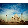 Vintage retro hipster style travel image of 
Taj Mahal. Indian Symbol - India travel background with grunge texture overlaid. Agra, India