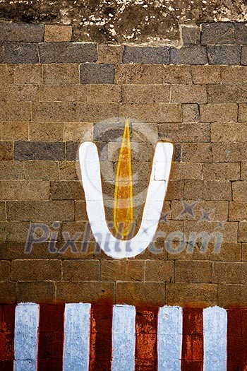 Vishnu symbol on wall of Hindu temple. India