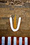 Vishnu symbol on wall of Hindu temple. India