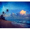 Vintage retro hipster style travel image of sunset on tropical beach. Sri Lanka with grunge texture overlaid