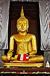 Sitting Buddha statue in Temple of the Tooth. Kandy, Sri Lanka