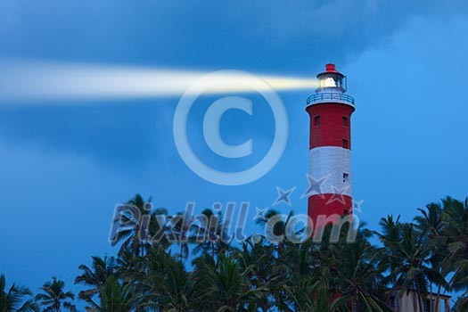 Lighthouse in night with light beam Lighthouse in night with light beam