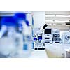 Chemistry lab (shallow DOF; focus on the beakers in the foreground)