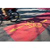 cyclist in bicycle lane on busy street