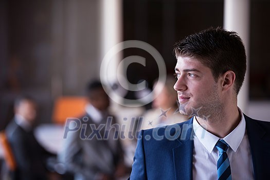happy young business man portrait in bright modern office indoor happy young business man portrait in bright modern office indoor