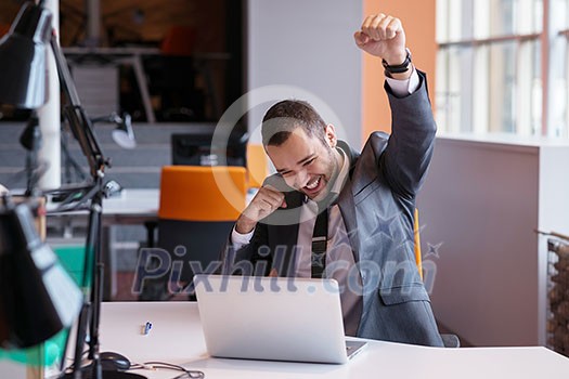 happy young business man portrait in bright modern office indoor happy young business man portrait in bright modern office indoor