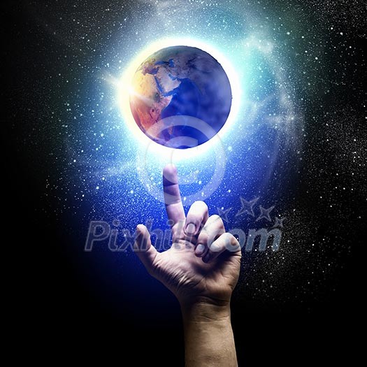 Human hand and earth planet. Ecology concept. Elements of this image are furnished by NASA