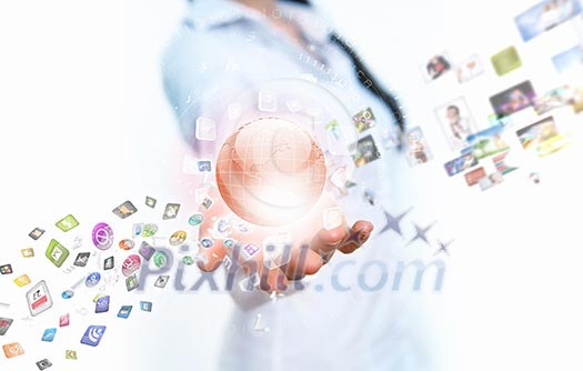 Image of globe on palm of businesswoman. Media technologies