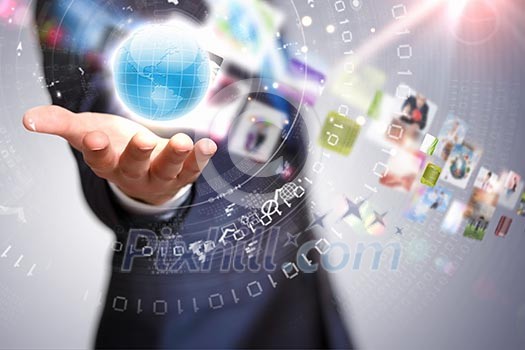 Image of globe on palm of businessman. Media technologies