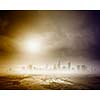 Background image of modern city in clouds