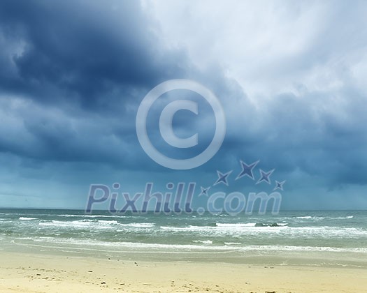 Sea shore view image with clouds above