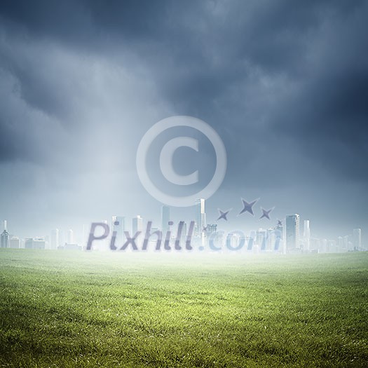 Background image of modern city in clouds