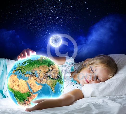 Girl in bed with Earth planet in hands. Elements of this image are furnished by NASA