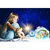 Girl sitting in bed and dreaming. Elements of this image are furnished by NASA