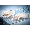 Close up image of businesswoman hands typing on keyboard