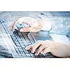 Close up image of businesswoman hands typing on keyboard