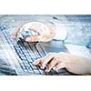 Close up image of businesswoman hands typing on keyboard