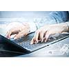 Close up image of businesswoman hands typing on keyboard