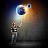 Image of man builder looking at planet Earth. Elements of this image are furnished by NASA