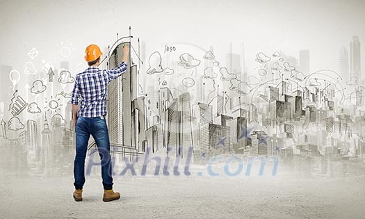 Image of man engineer against building project sketch