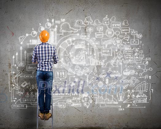 Image of man engineer against building project sketch Image of man engineer against building project sketch