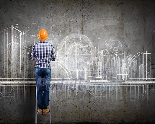 Image of man engineer against building project sketch Image of man engineer against building project sketch