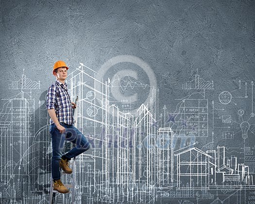 Image of man engineer against building project sketch Image of man engineer against building project sketch